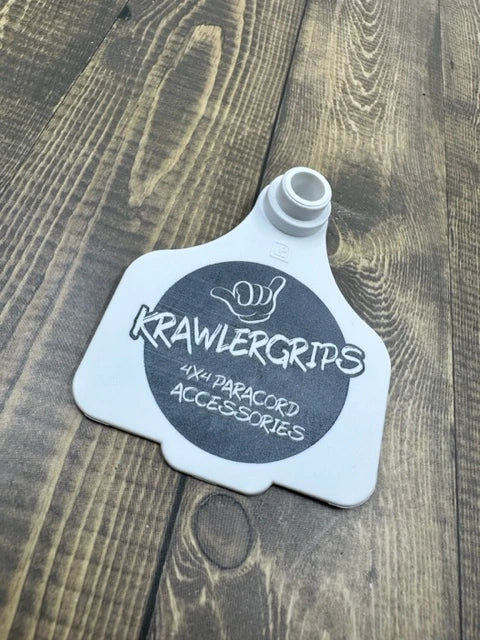 white cattle tag - krawlergrips